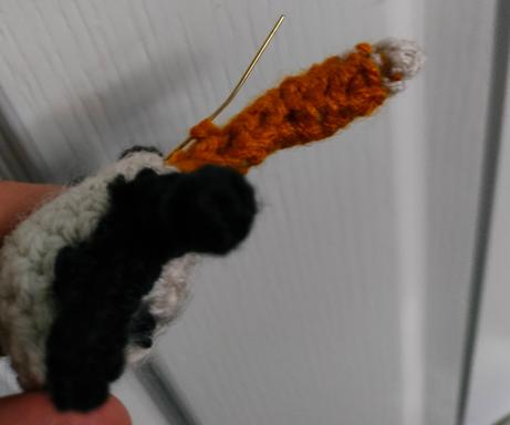 A close up of the hilt, and wire