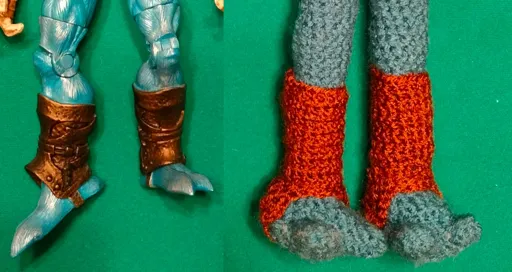 An image comparing the doll's greaves to the toy's