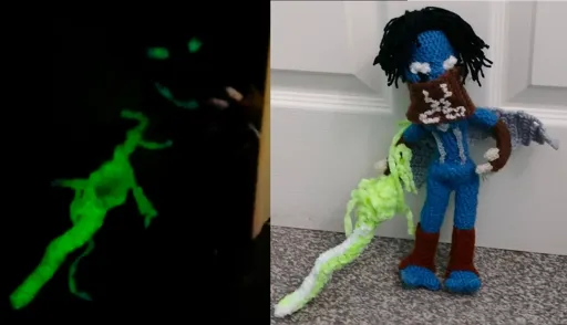 The doll glowing in the dark, and in bright light