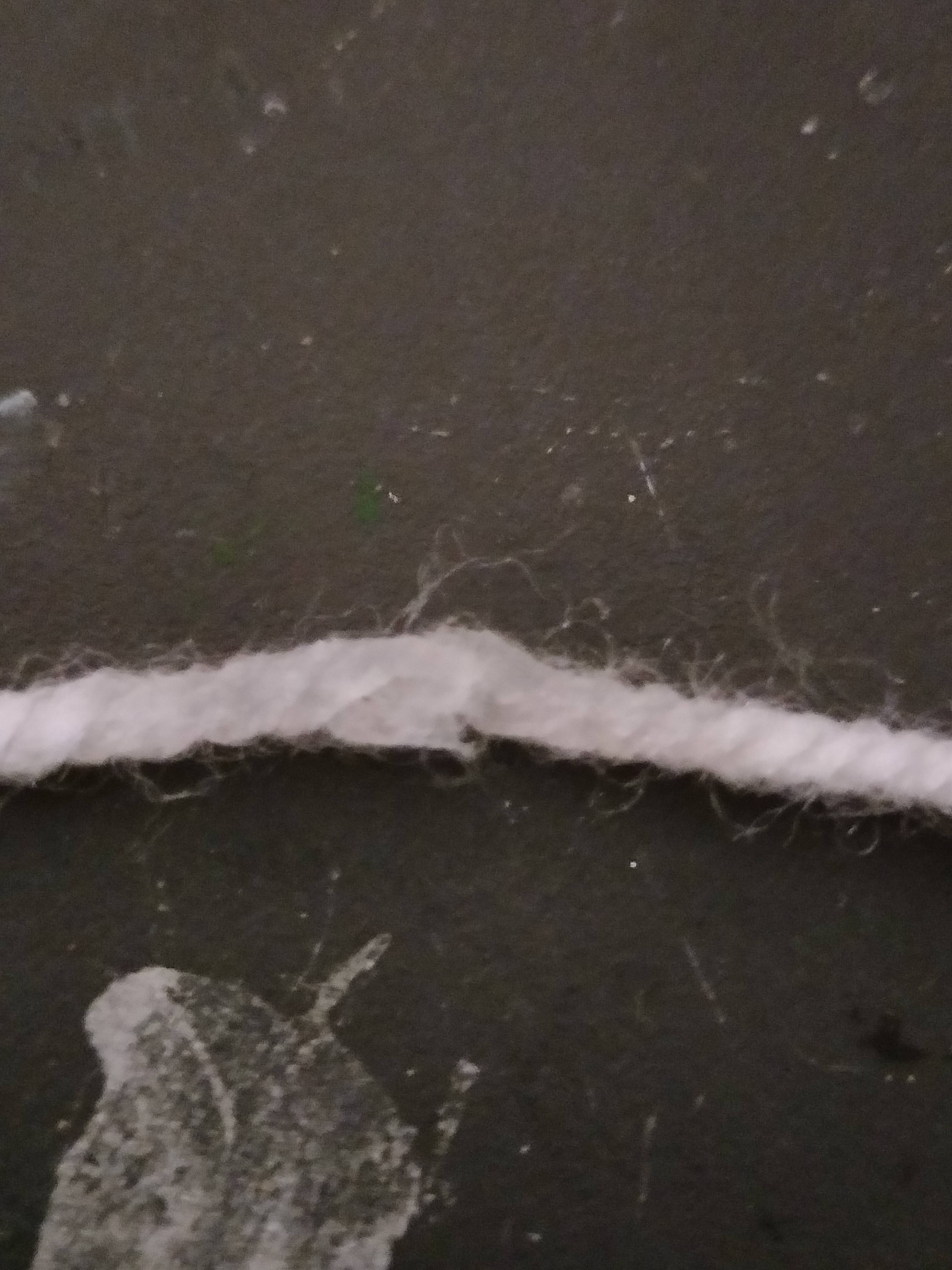 Some scrap yarn, with fresh plastic model-kit-glue applied